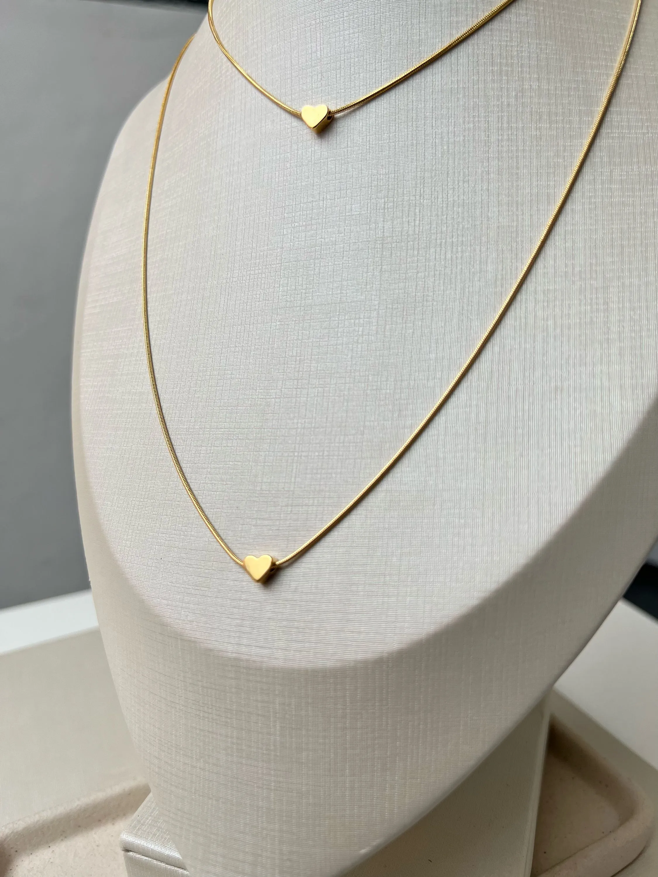 Colar duplo pingente coração