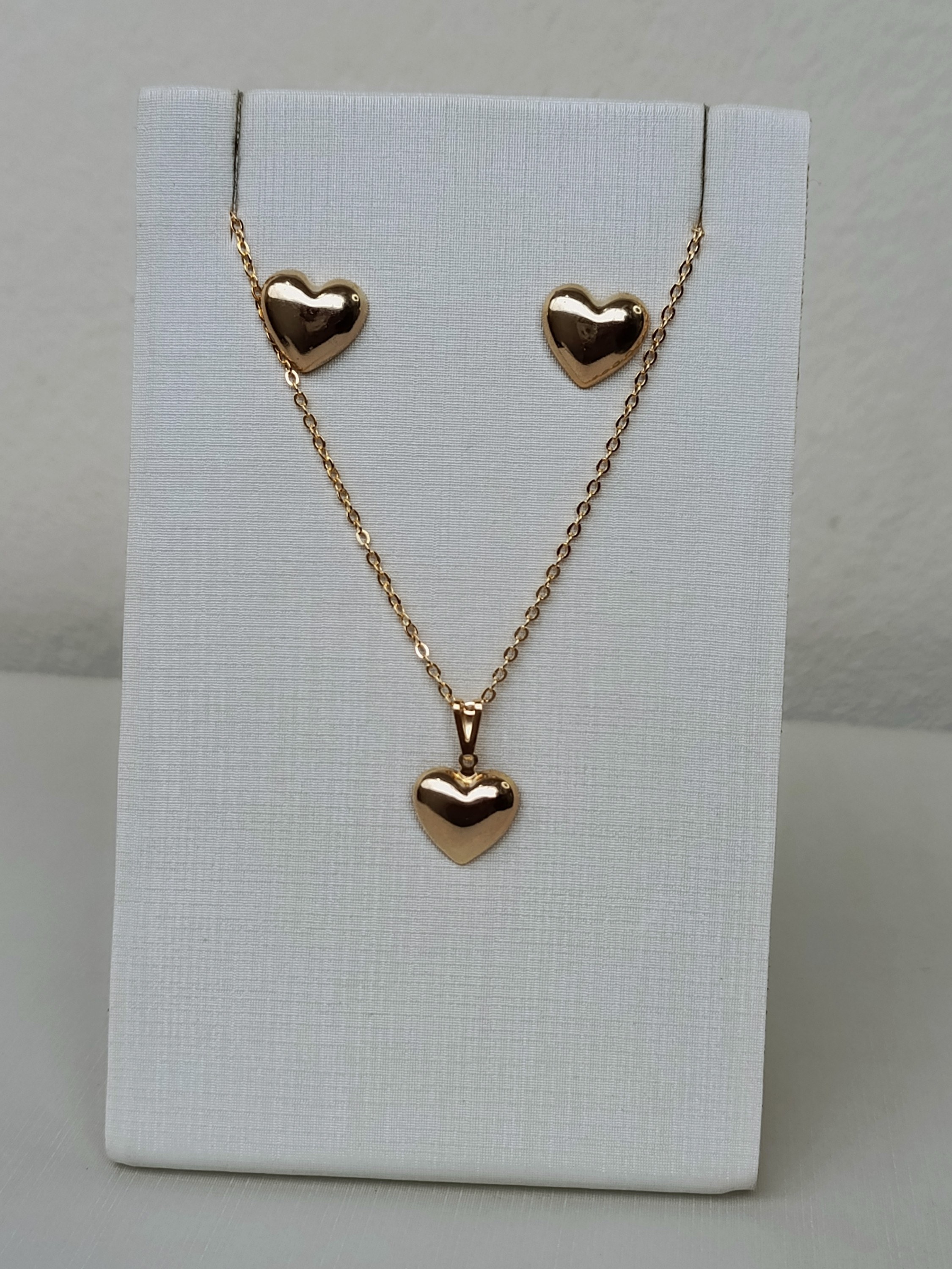 Conjunto de corações dourados