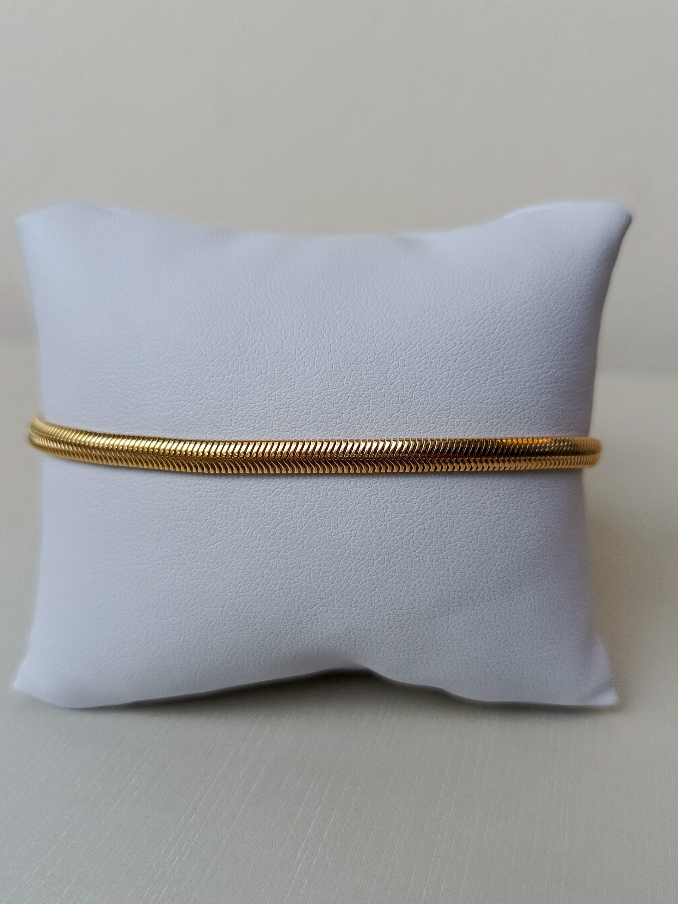 Pulseira de malha dourada