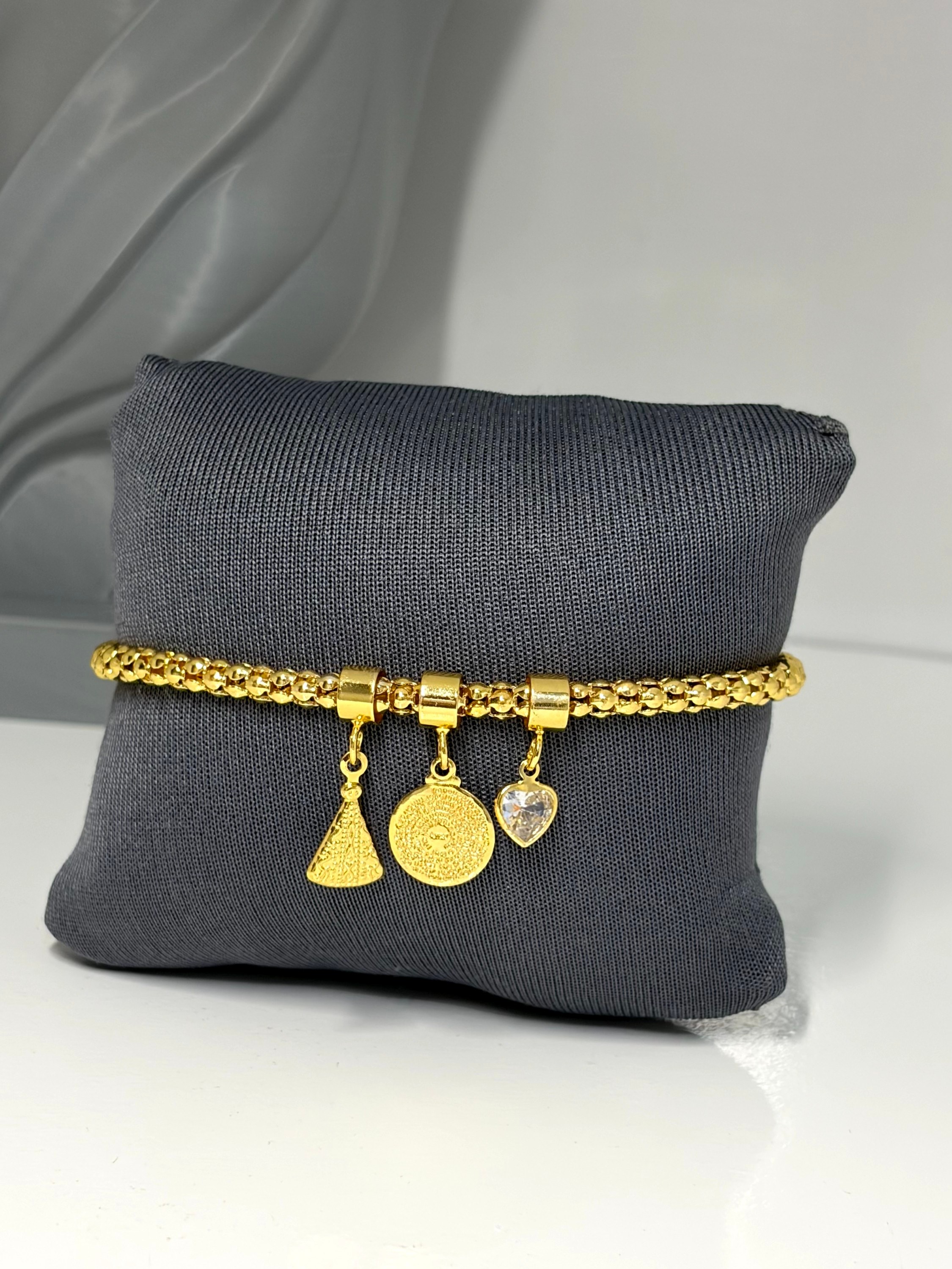 Pulseira com pingente religiosos