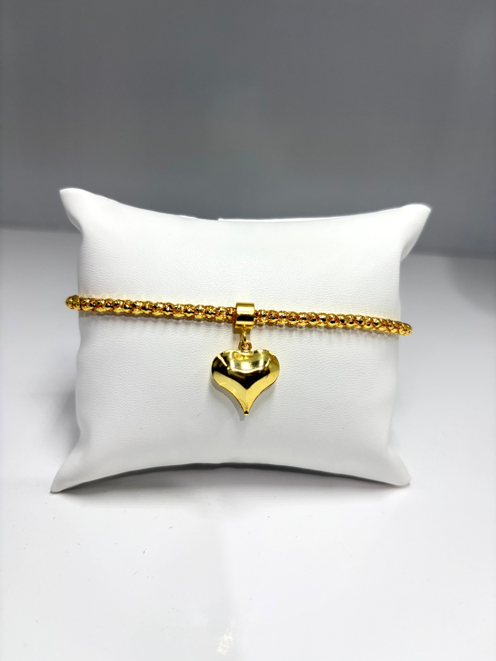 Pulseira com pingente de coração