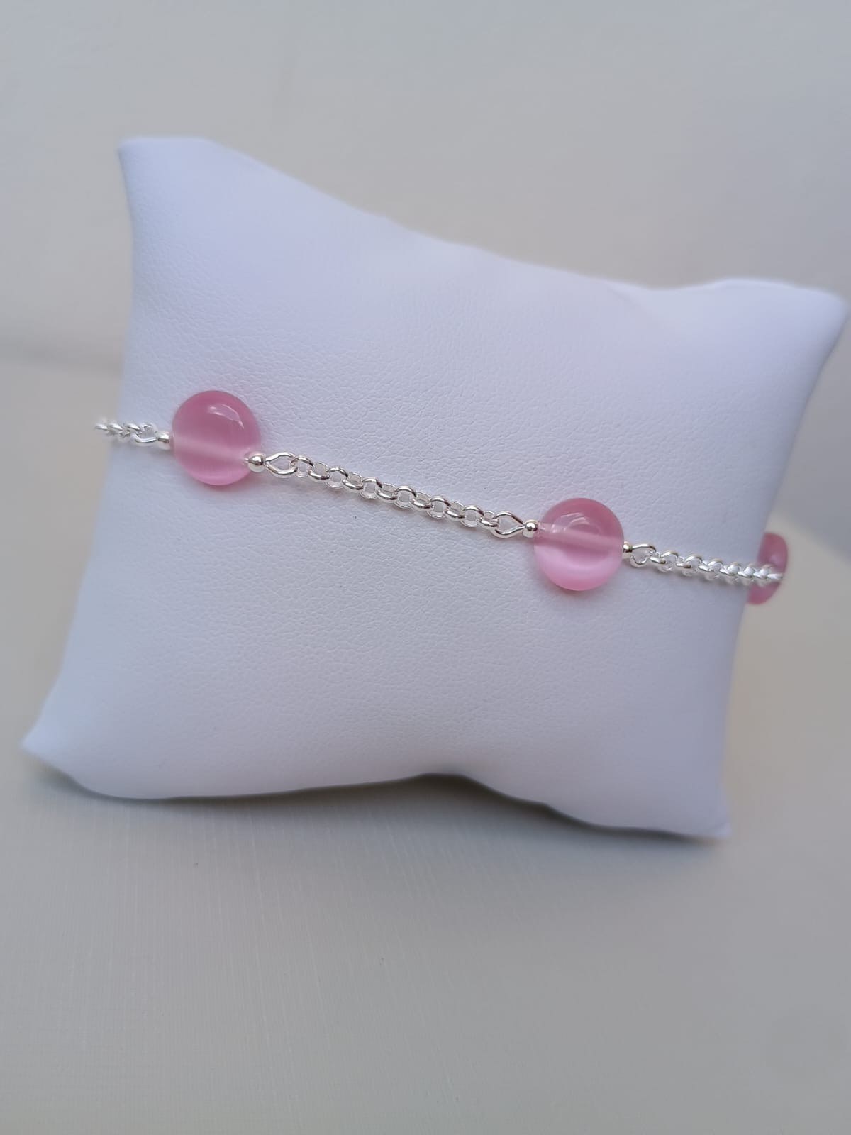 Pulseira com pingente rosa