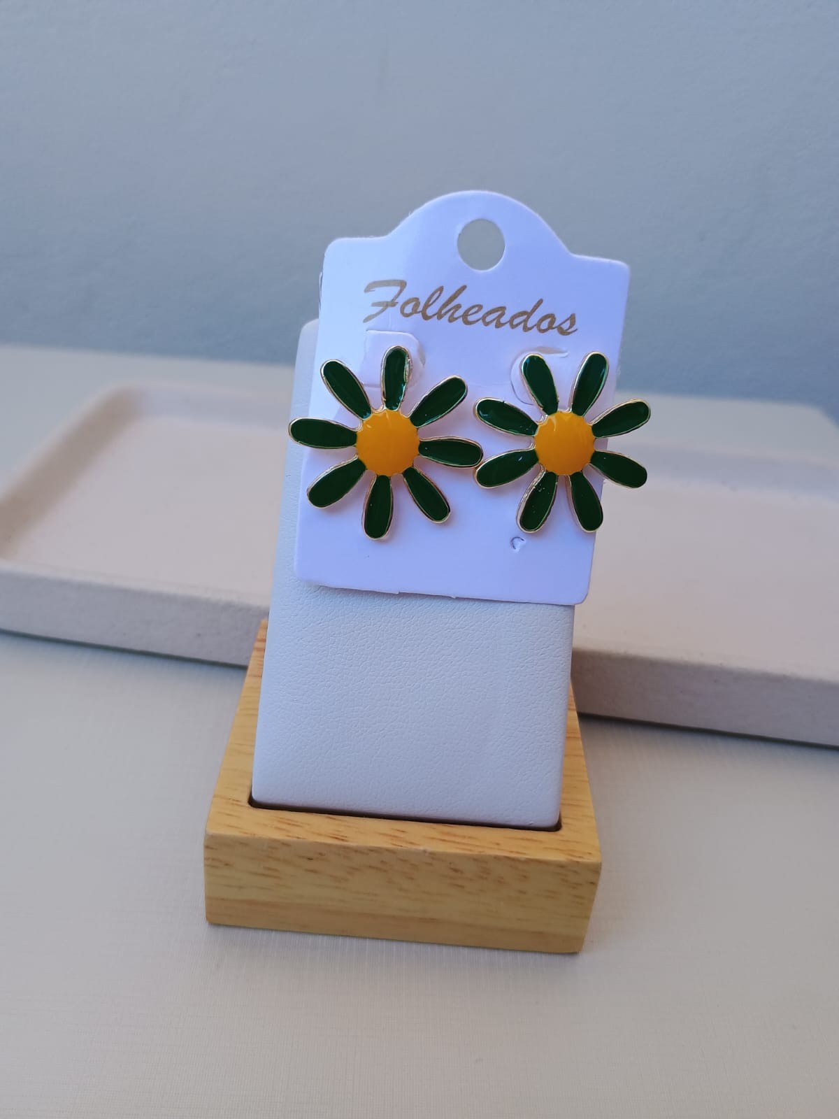 Brinco de flor da copa