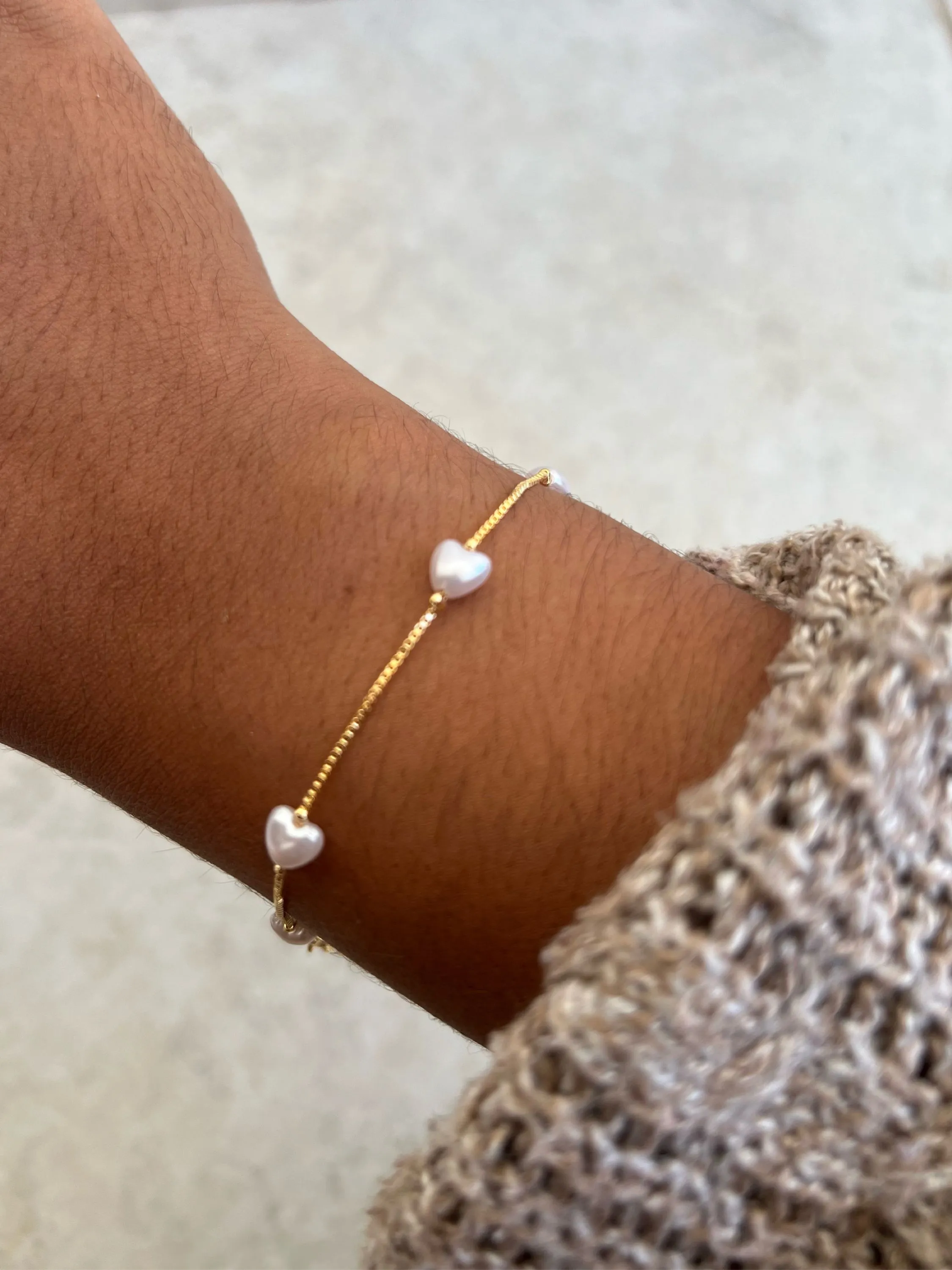 Pulseira coração em pérolas
