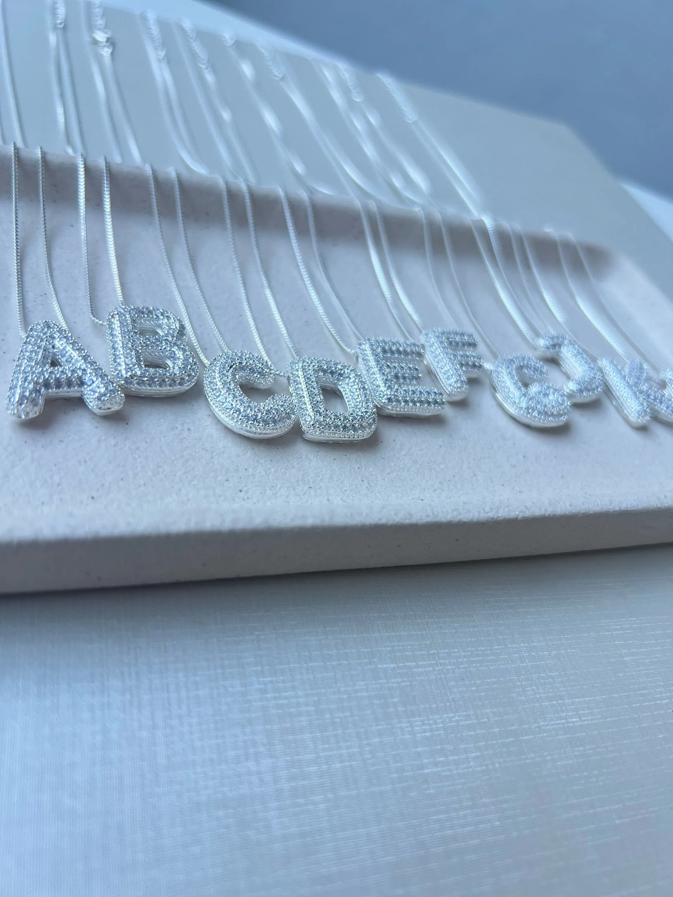 Colar letra inicial D