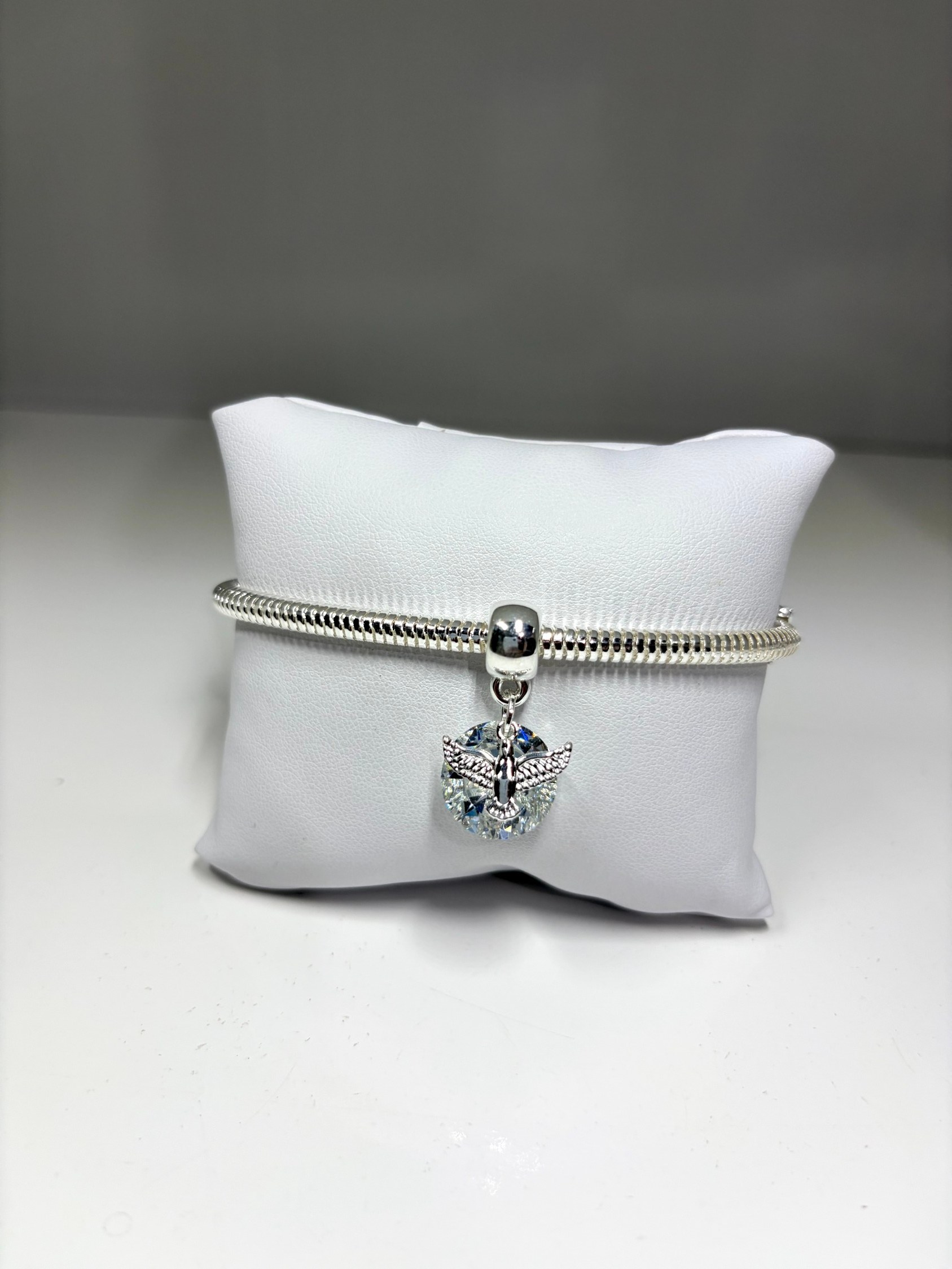 Pulseira com pingente do espírito santo