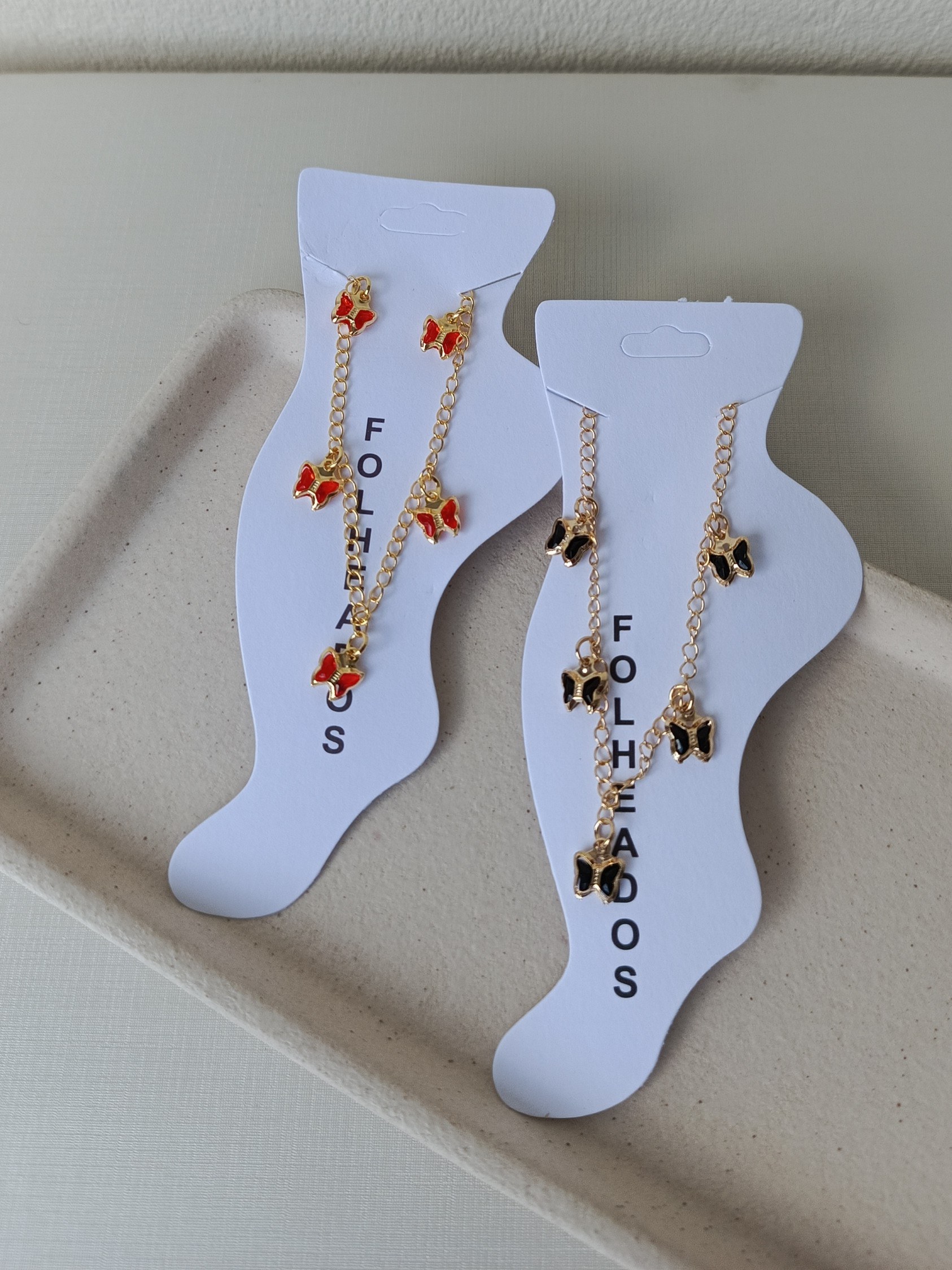 Tornozeleira com pingente de borboleta