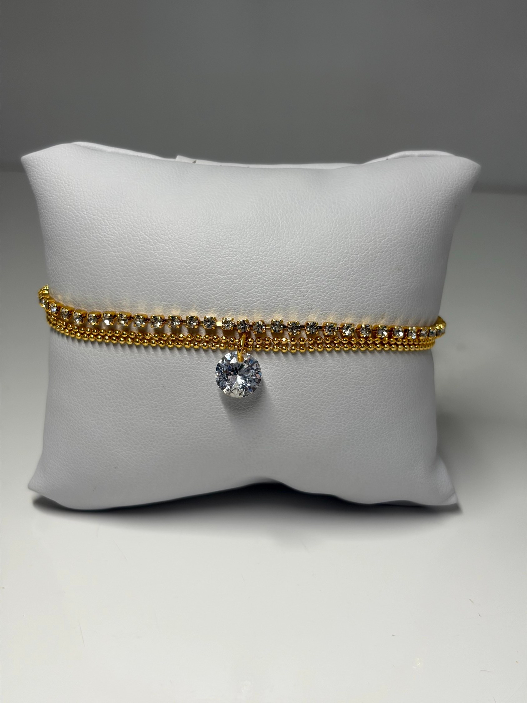 Pulseira tripla com ponto de luz e strass