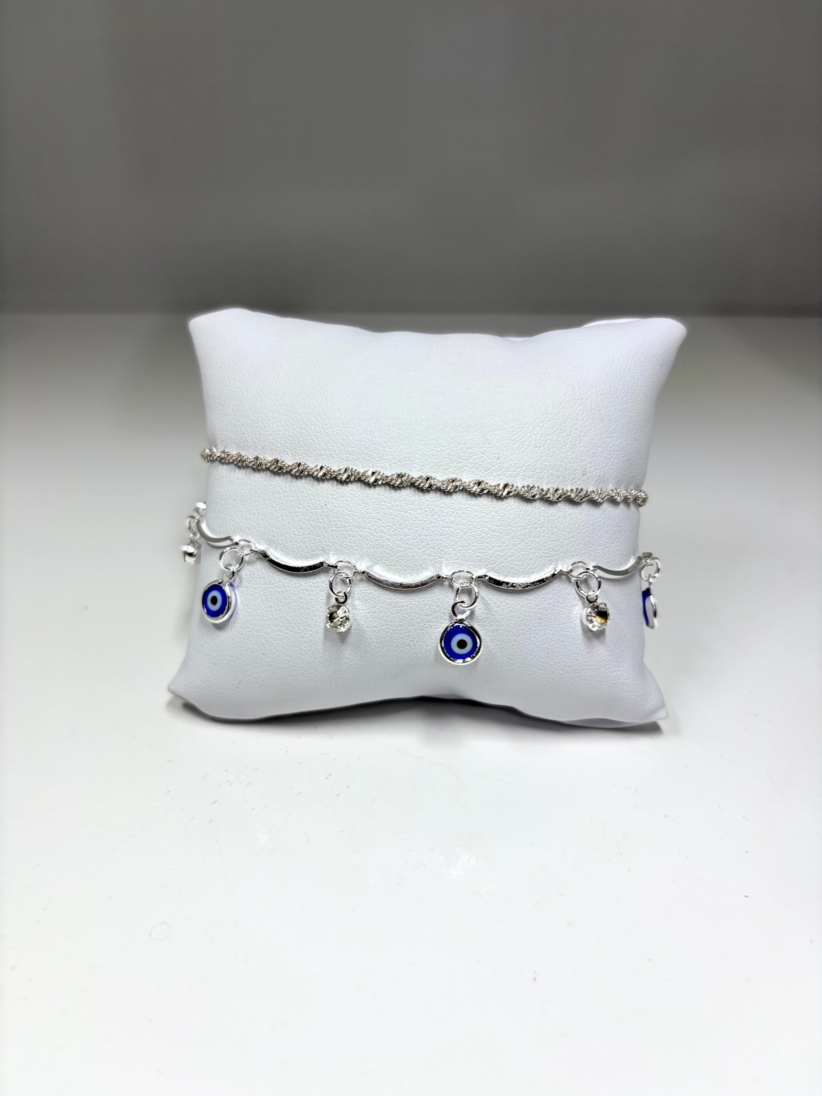 Pulseira dupla com olho grego e ponto de luz