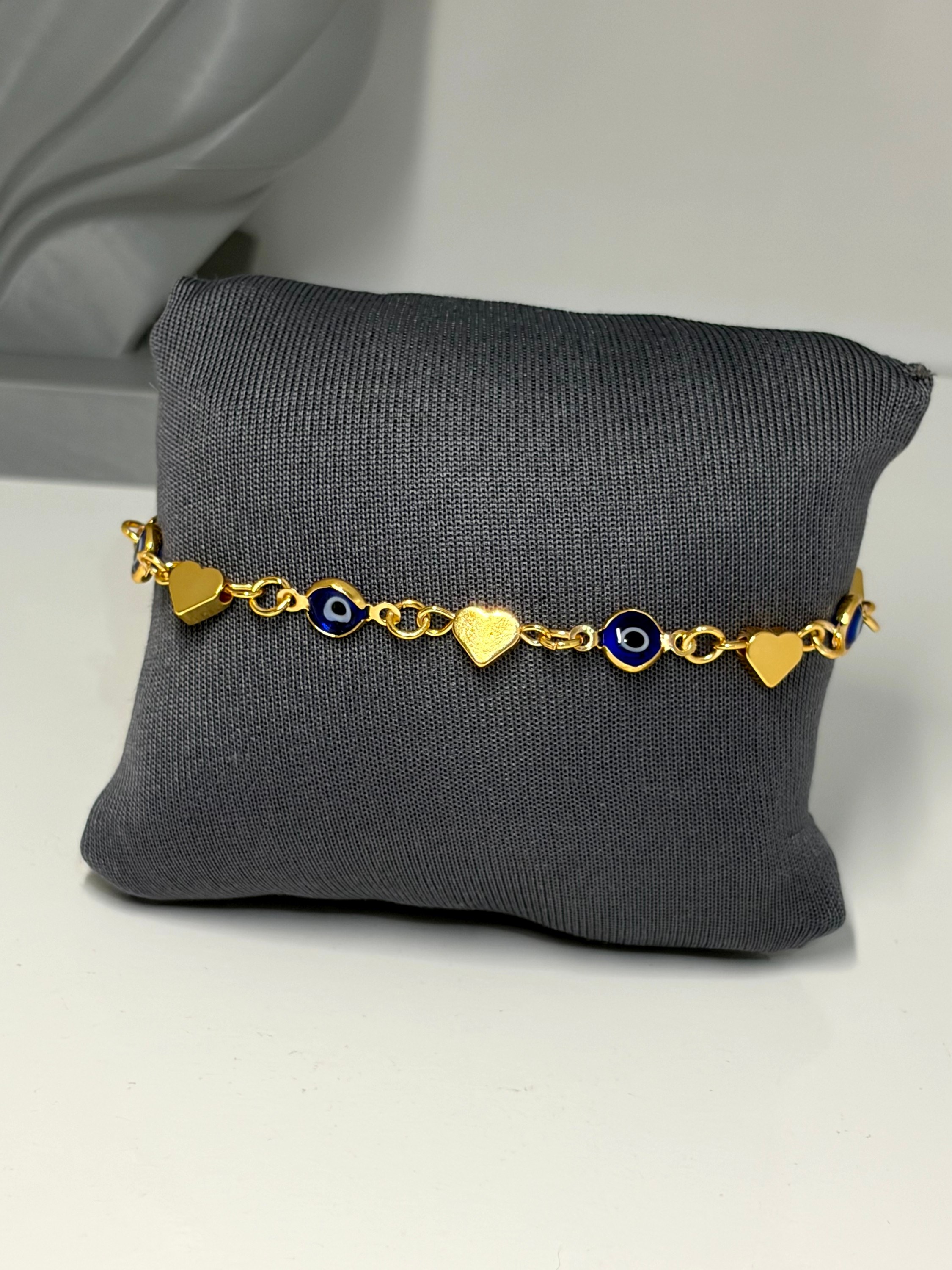 Pulseira de corações com olho grego