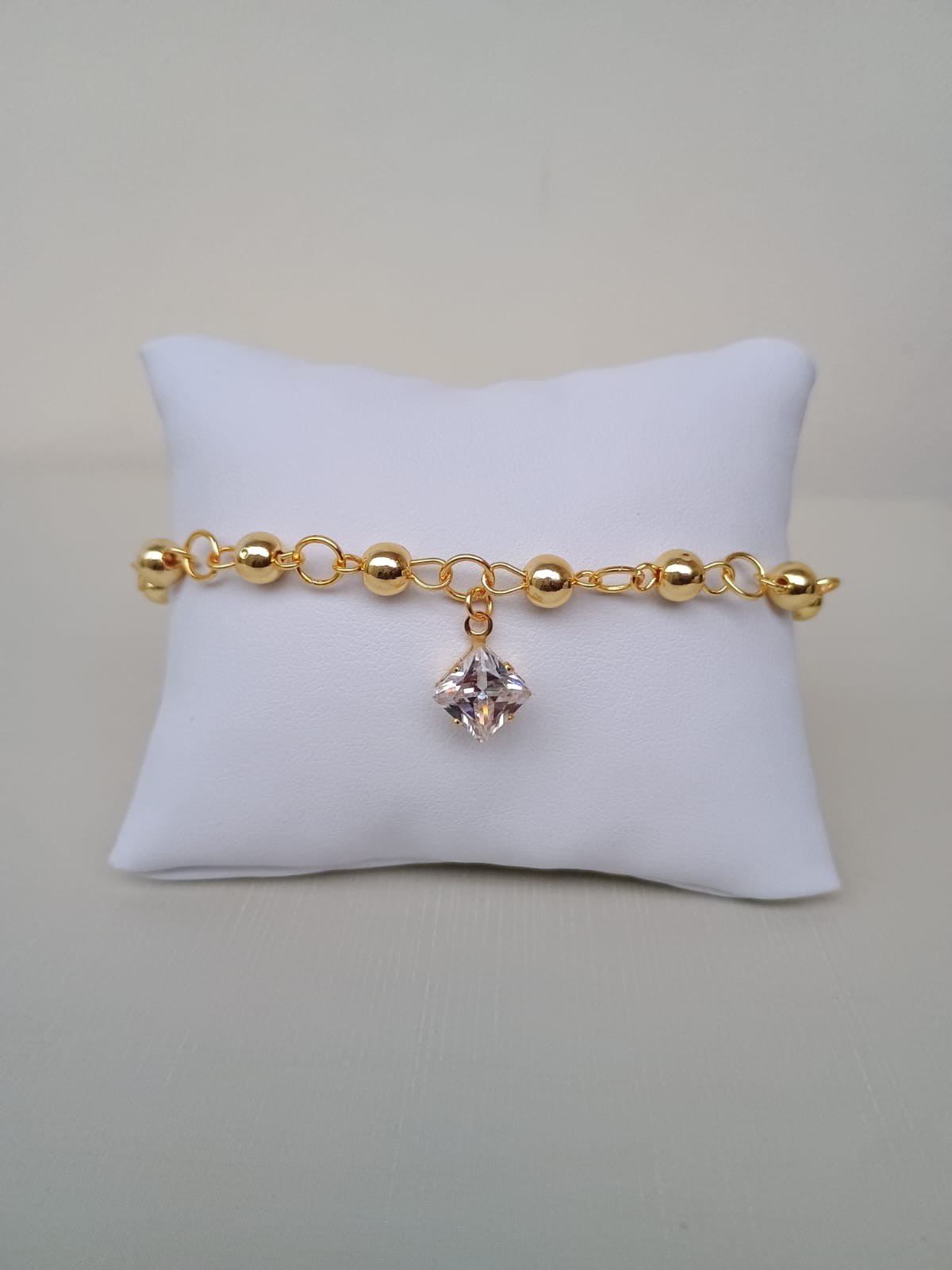 Pulseira com bolinhas e quadrado de luz