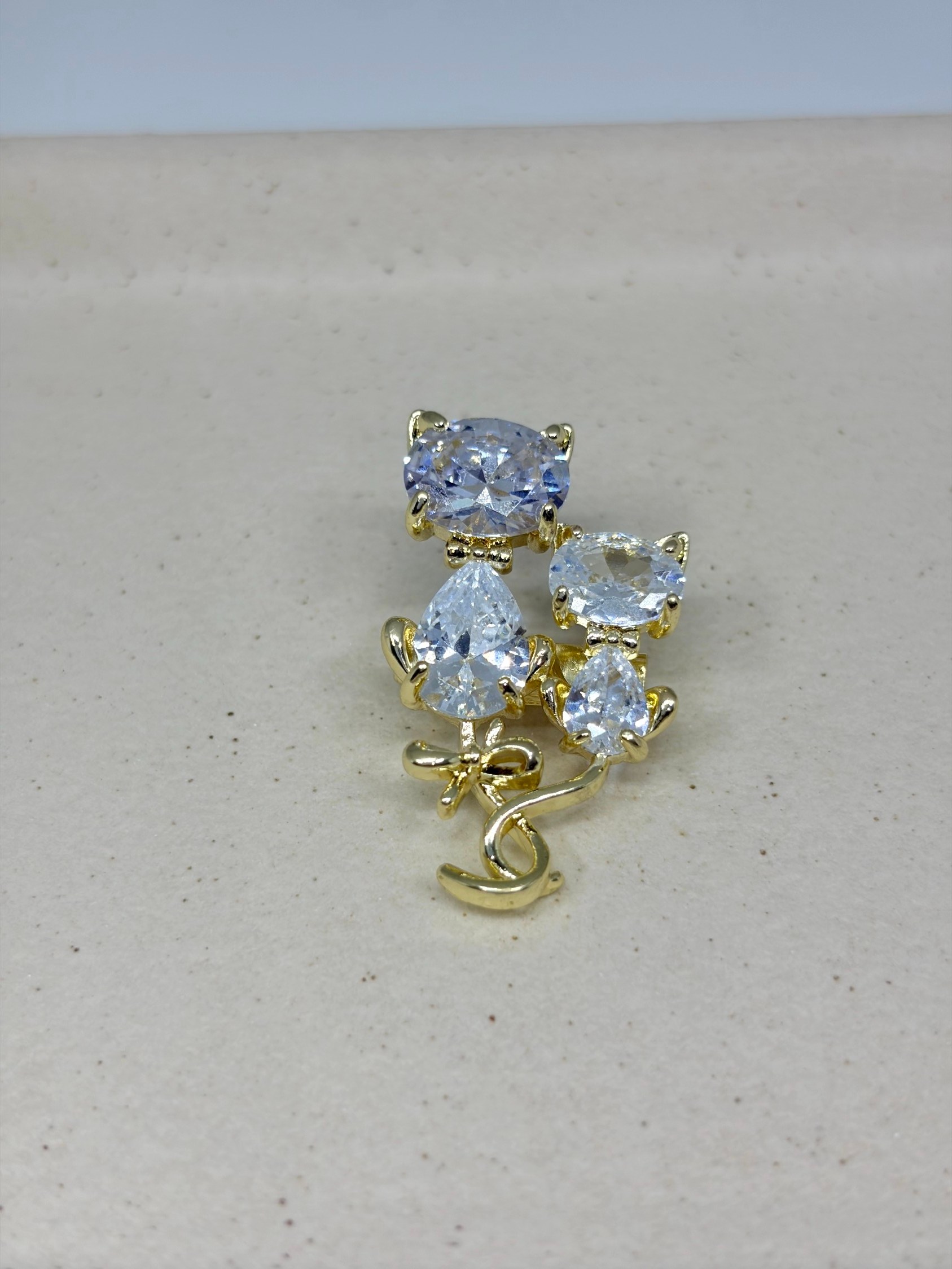 Broche de gatinhos
