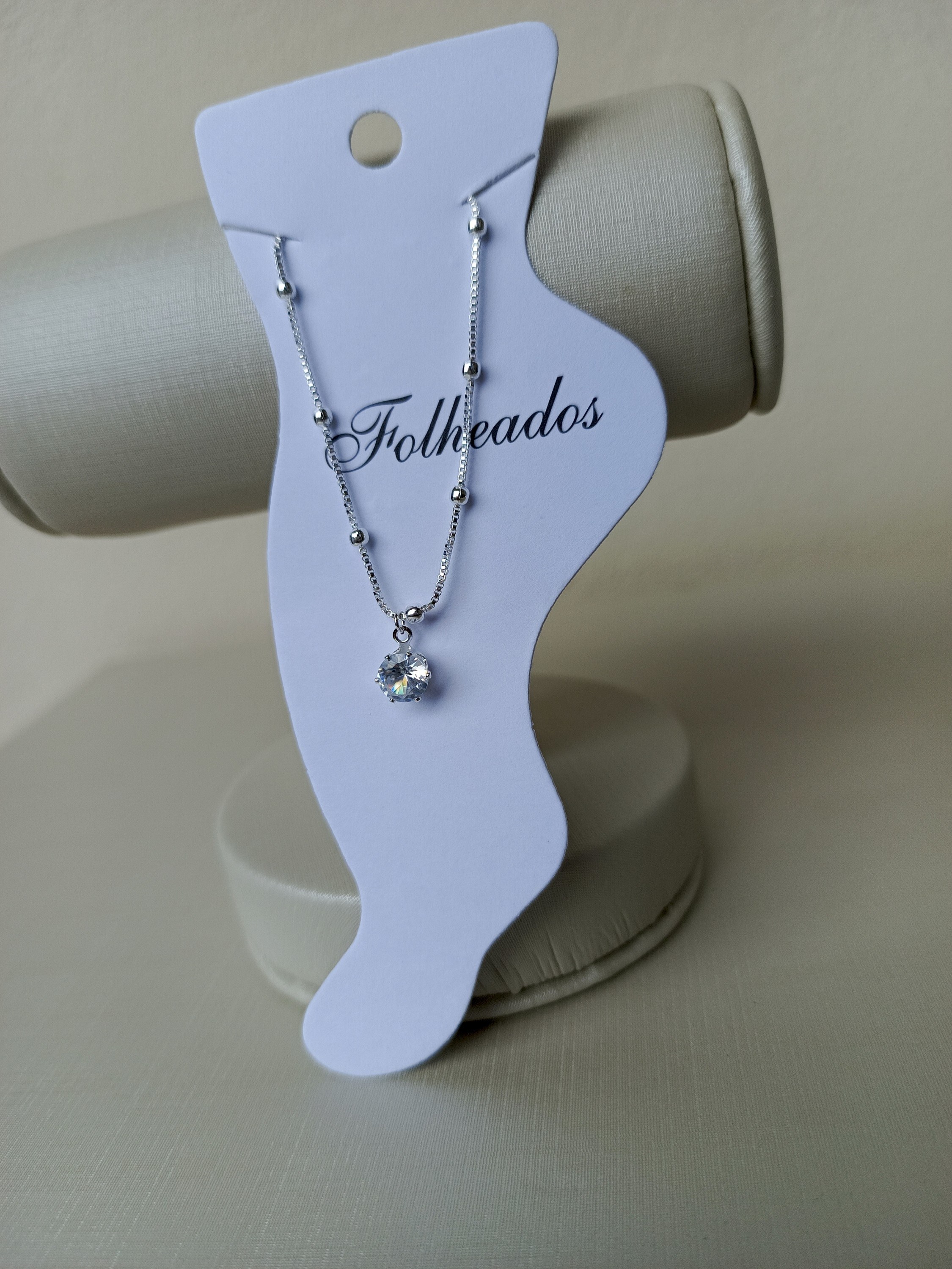 Tornozeleira com pingente de zircônia