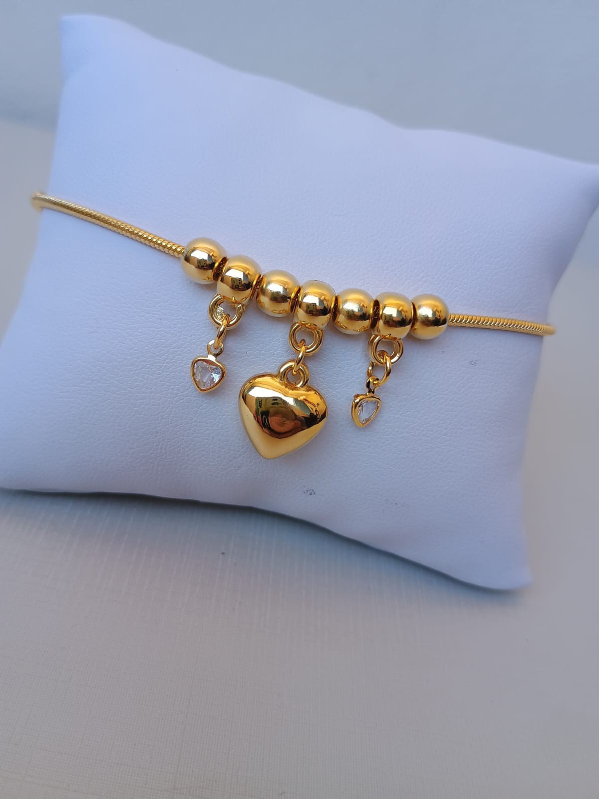 Pulseira com pingente de coração