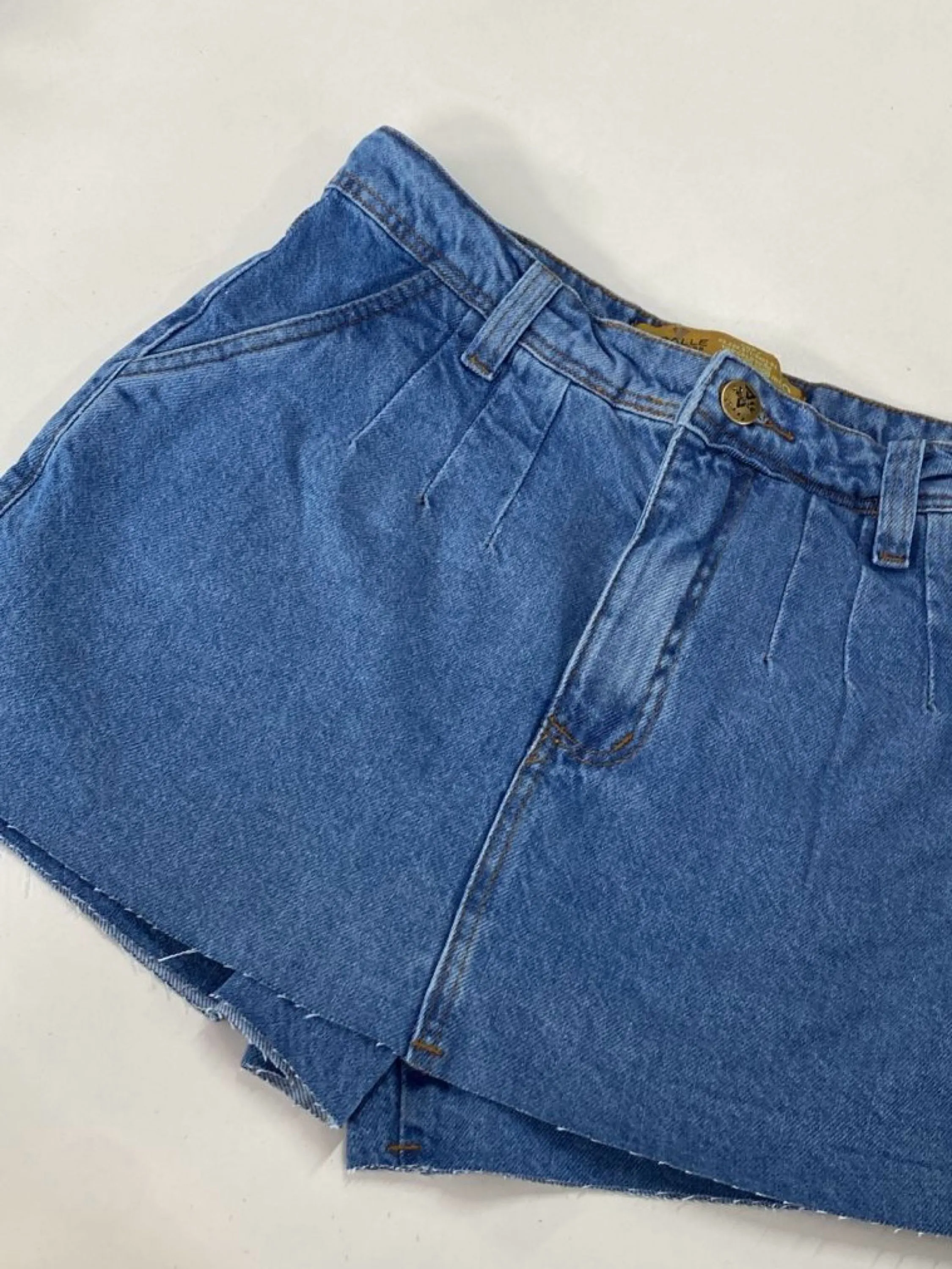 Short saia jeans