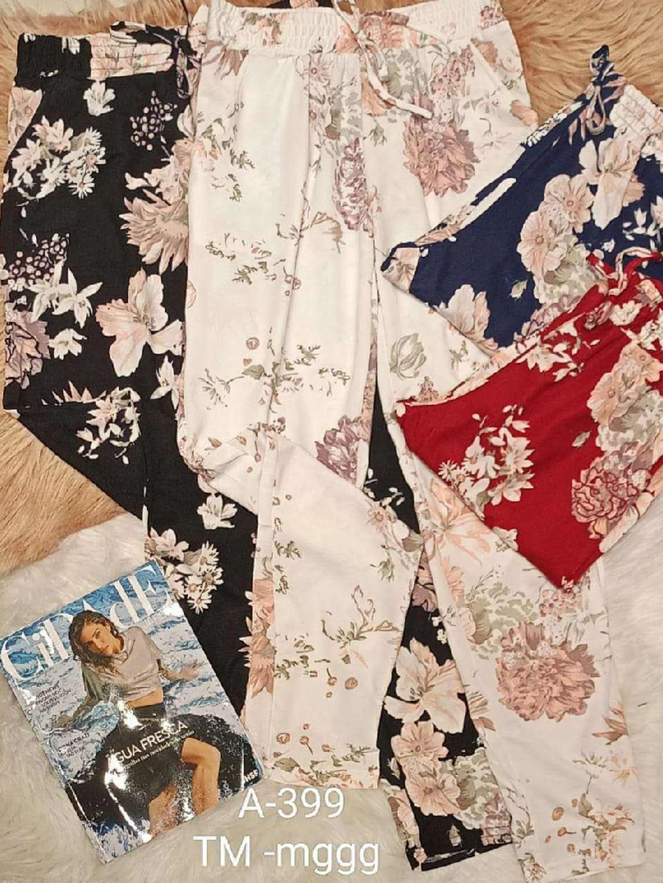 Calça estampa floral poliéster com elastano elástico na cintura detalhe cordão amarração A399