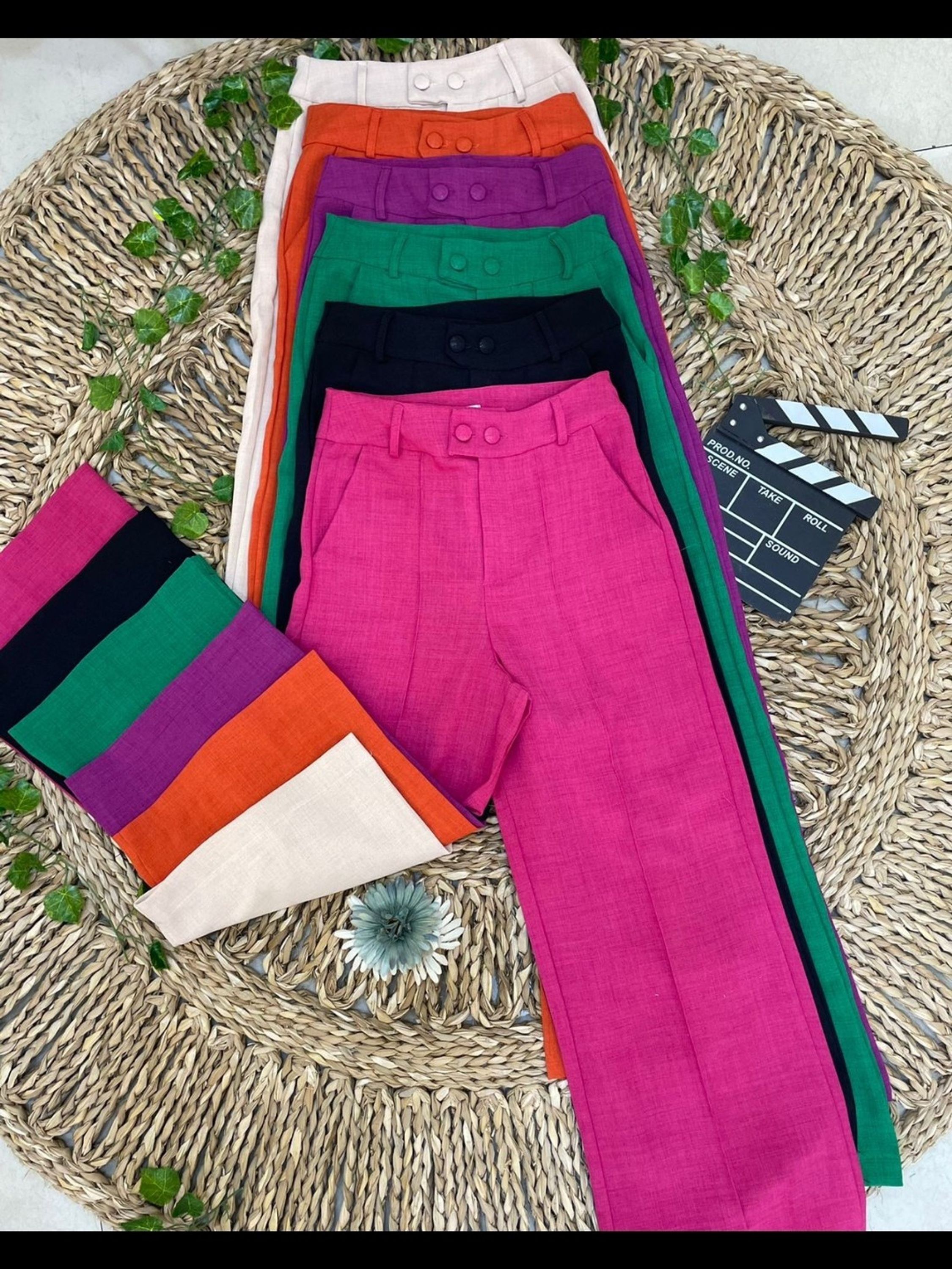 Calça flare linho com dois botão