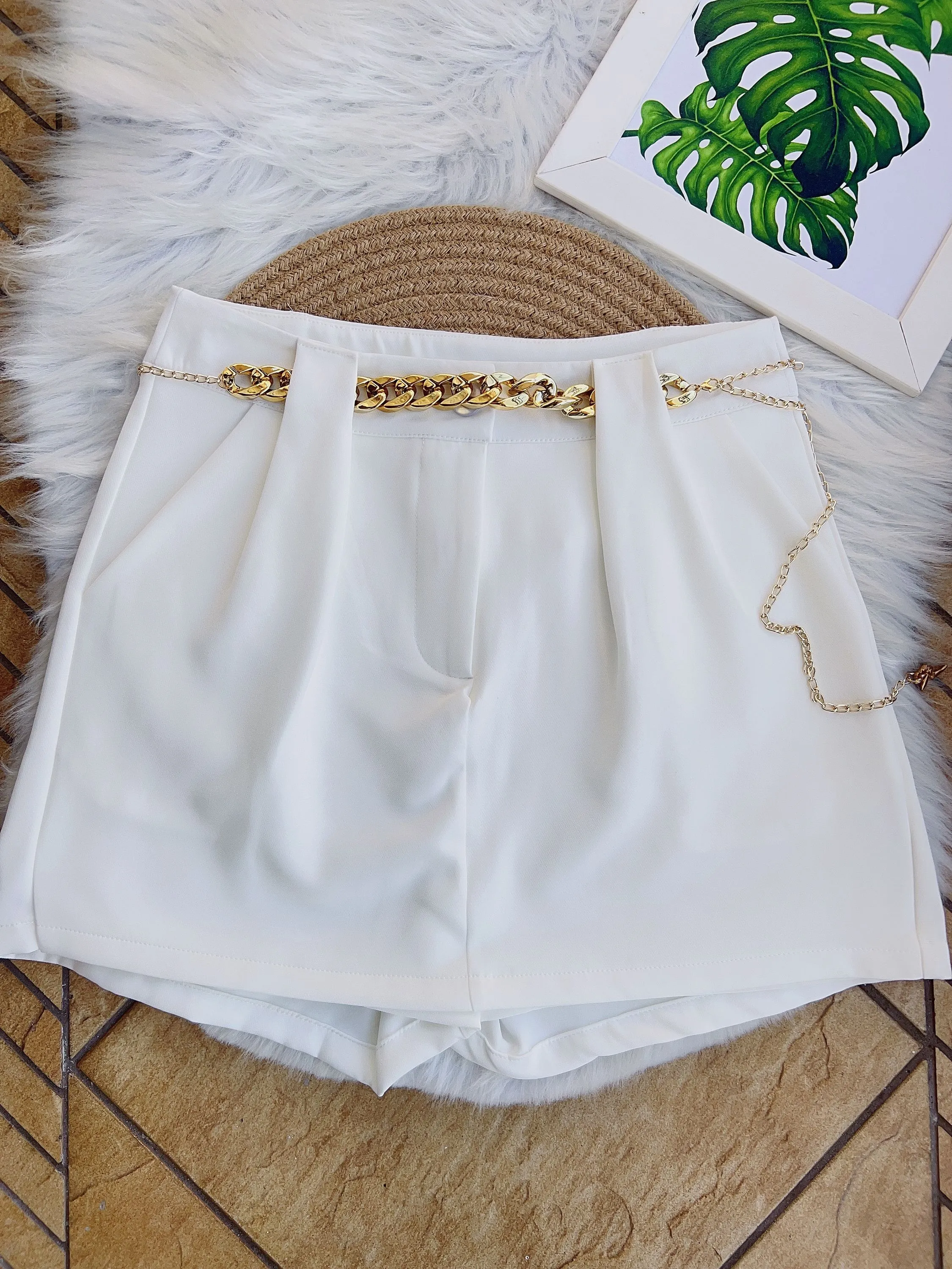 Short saia de alfaiataria /botão/zíper/bolso/feminina/panpan fashion