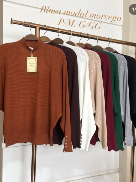 Blusa modal manga morcego com botão