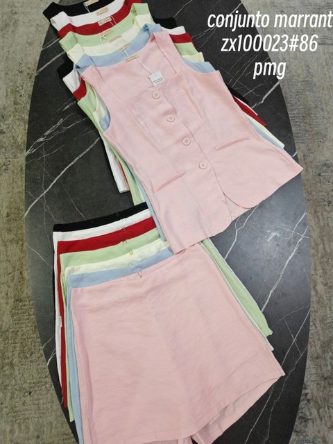 conjunto de marrant colete com short saia