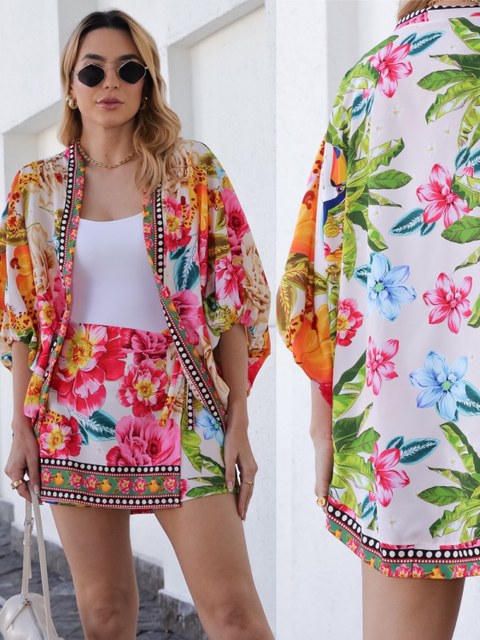 Conjunto 2 pc  feminino ( kimono + short saia )   , atacado: 45 reais//// estampa- flores, folhas, pássaros. tecido crepinho , tamanho U veste 42