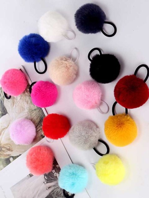 Xuxinha com pompom de pelúcia